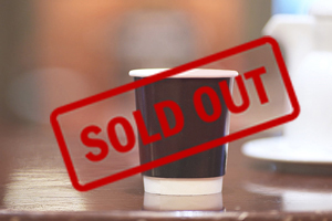 A hand holding a coffee cup  Description automatically generated with medium confidence